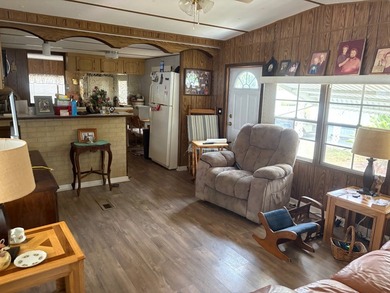 This home is located on the Canal to Lake Huntley and offers 3 - photo 12