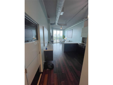Uptown Marina Lofts high-floor condo boasts stunning views from - photo 8