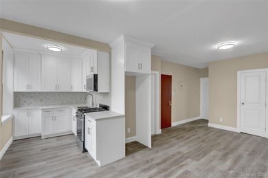 This attractive triplex has a beautifully restored facade that - photo 13