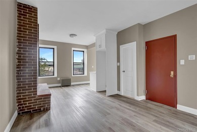 This attractive triplex has a beautifully restored facade that - photo 18