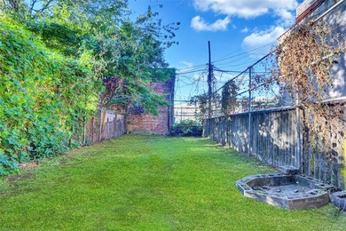 This attractive triplex has a beautifully restored facade that - photo 25