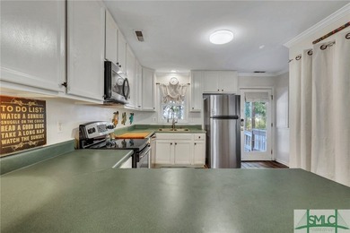 Discover an exceptional 4 bedroom, 4 bath home situated on just - photo 33