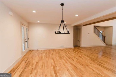 HUGE PRICE REDUCTION! LAKE HOME WITH 200 FEET OF SHORE LINE ON A - photo 6