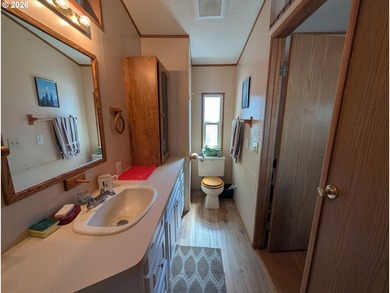 Welcome to this well-maintained manufactured home in the - photo 11