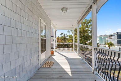 Welcome to 107 SE 71st Street, a coastal retreat nestled in the