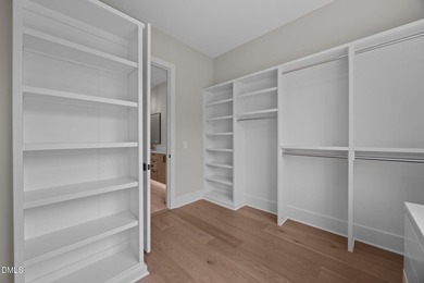 Custom built by Russin Homes in a private community with - photo 21