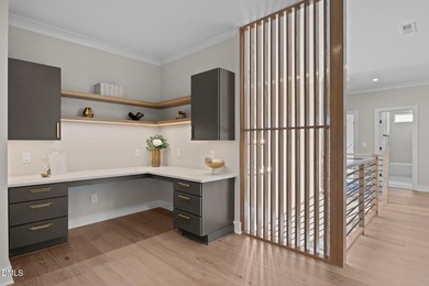 Custom built by Russin Homes in a private community with - photo 22