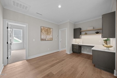 Custom built by Russin Homes in a private community with - photo 23