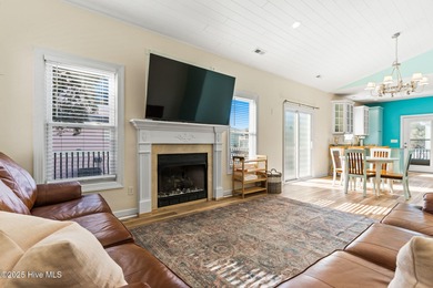 Welcome to 107 SE 71st Street, a coastal retreat nestled in the