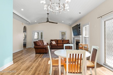 Welcome to 107 SE 71st Street, a coastal retreat nestled in the