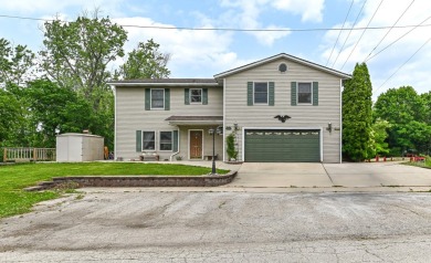 This park-like setting will make you feel as though you are - Lake Home For Sale in Burlington, Wisconsin