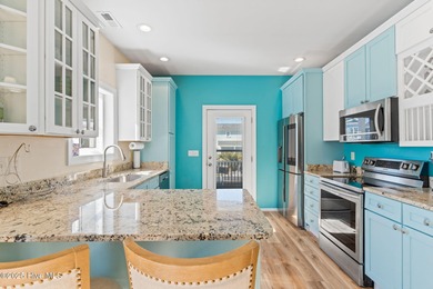 Welcome to 107 SE 71st Street, a coastal retreat nestled in the