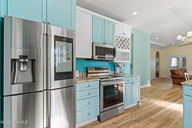 Welcome to 107 SE 71st Street, a coastal retreat nestled in the