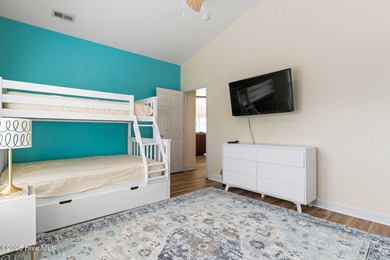 Welcome to 107 SE 71st Street, a coastal retreat nestled in the