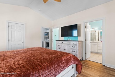 Welcome to 107 SE 71st Street, a coastal retreat nestled in the