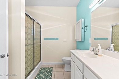 Welcome to 107 SE 71st Street, a coastal retreat nestled in the