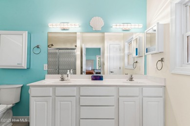 Welcome to 107 SE 71st Street, a coastal retreat nestled in the