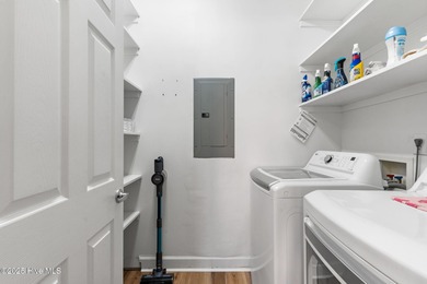 Welcome to 107 SE 71st Street, a coastal retreat nestled in the