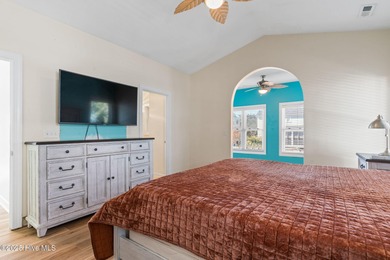 Welcome to 107 SE 71st Street, a coastal retreat nestled in the