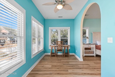 Welcome to 107 SE 71st Street, a coastal retreat nestled in the