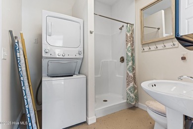 Welcome to 107 SE 71st Street, a coastal retreat nestled in the