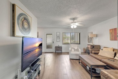 Rare 1st Floor Gem in Isle of Capri - Fully Updated! Experience - photo 1