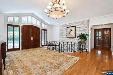 Beautifully updated ranch set atop a private 1.6-acre lot at the - photo 3