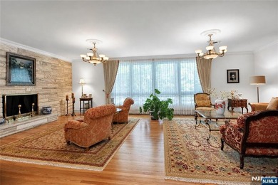 Beautifully updated ranch set atop a private 1.6-acre lot at the - photo 4