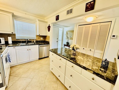 Charming 1-bedroom, 1.5-bath condo with serene east-facing water - photo 14