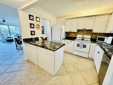 Charming 1-bedroom, 1.5-bath condo with serene east-facing water - photo 16