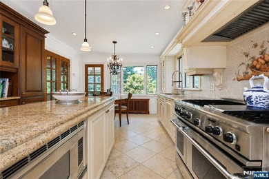 Beautifully updated ranch set atop a private 1.6-acre lot at the - photo 8