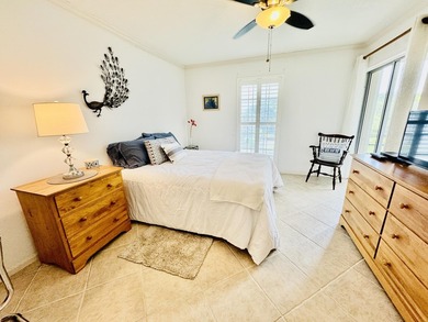Charming 1-bedroom, 1.5-bath condo with serene east-facing water - photo 18