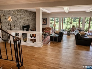 Beautifully updated ranch set atop a private 1.6-acre lot at the - photo 9