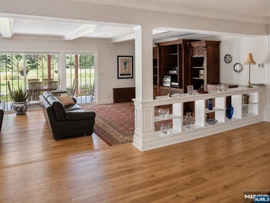 Beautifully updated ranch set atop a private 1.6-acre lot at the - photo 10