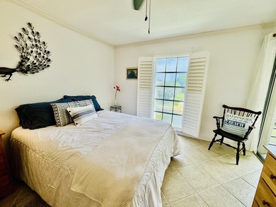 Charming 1-bedroom, 1.5-bath condo with serene east-facing water - photo 20