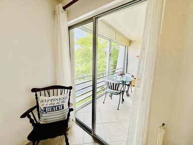 Charming 1-bedroom, 1.5-bath condo with serene east-facing water - photo 21