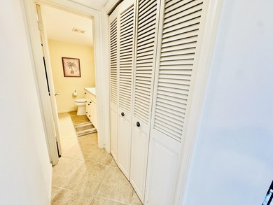 Charming 1-bedroom, 1.5-bath condo with serene east-facing water - photo 25