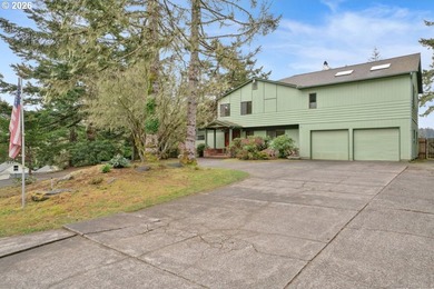 Nestled on 1.03 private acres, this spacious 3-level home offers - photo 1