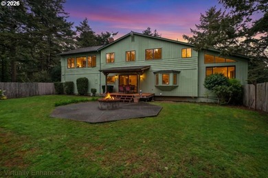 Nestled on 1.03 private acres, this spacious 3-level home offers - photo 2
