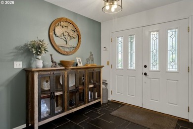 Nestled on 1.03 private acres, this spacious 3-level home offers - photo 4