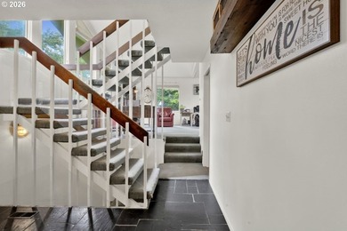 Nestled on 1.03 private acres, this spacious 3-level home offers - photo 5