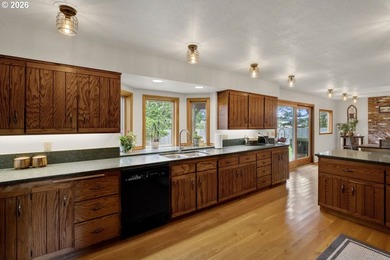 Nestled on 1.03 private acres, this spacious 3-level home offers - photo 9