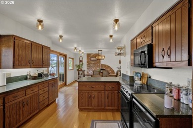 Nestled on 1.03 private acres, this spacious 3-level home offers - photo 10