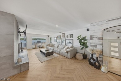 Welcome to this beautifully renovated lakefront retreat offering - photo 12