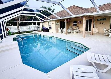 Welcome to this inviting three-bedroom, two-bathroom - photo 12