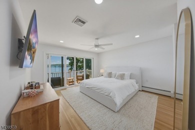 Welcome to this beautifully renovated lakefront retreat offering - photo 14