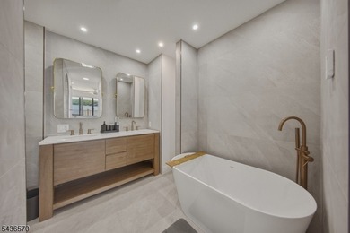 Welcome to this beautifully renovated lakefront retreat offering - photo 16