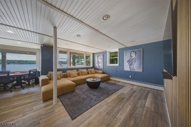 Welcome to this beautifully renovated lakefront retreat offering - photo 26