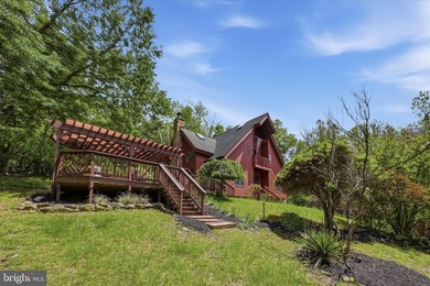 Tucked into a peaceful, cabin-style setting near the Shenandoah - photo 3
