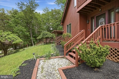Tucked into a peaceful, cabin-style setting near the Shenandoah - photo 6